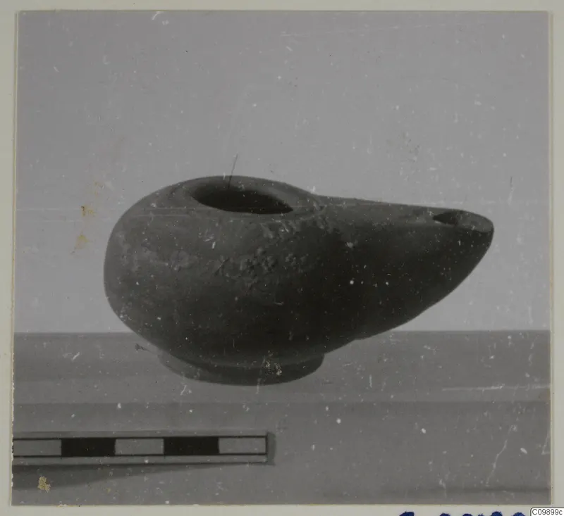 Oil lamp with a filling hole and pointed spout, from Ajii Omologitades, Politiko T1914 and Limassol Oasis T1