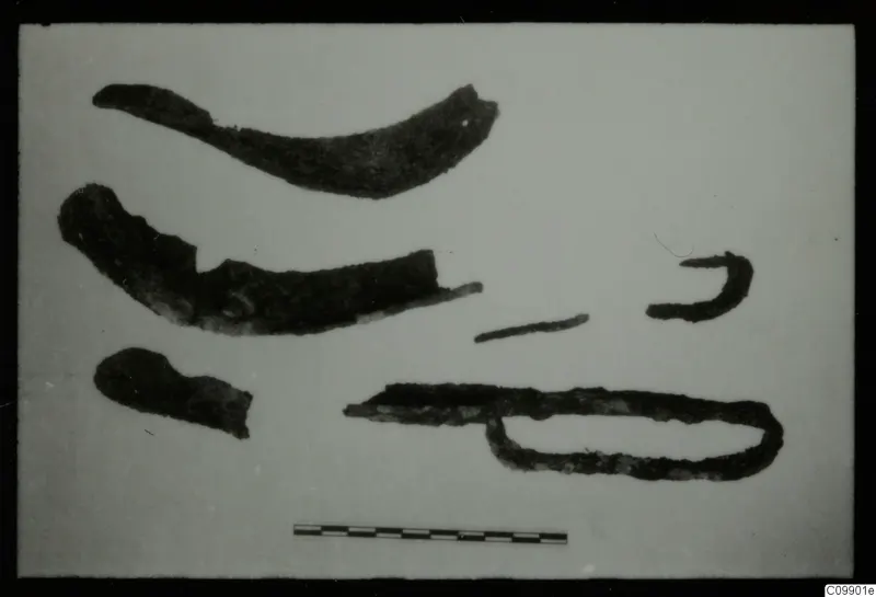 Corroded metal tools and fragments from Ajii Omologitades, Politiko T1914 and Limassol Oasis T1, with a scale bar.