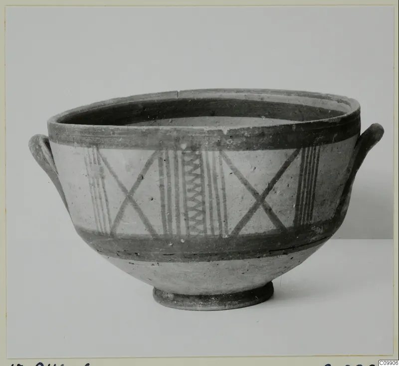 White Painted III-1 bowl with two loop handles and painted bands and patterns on the body