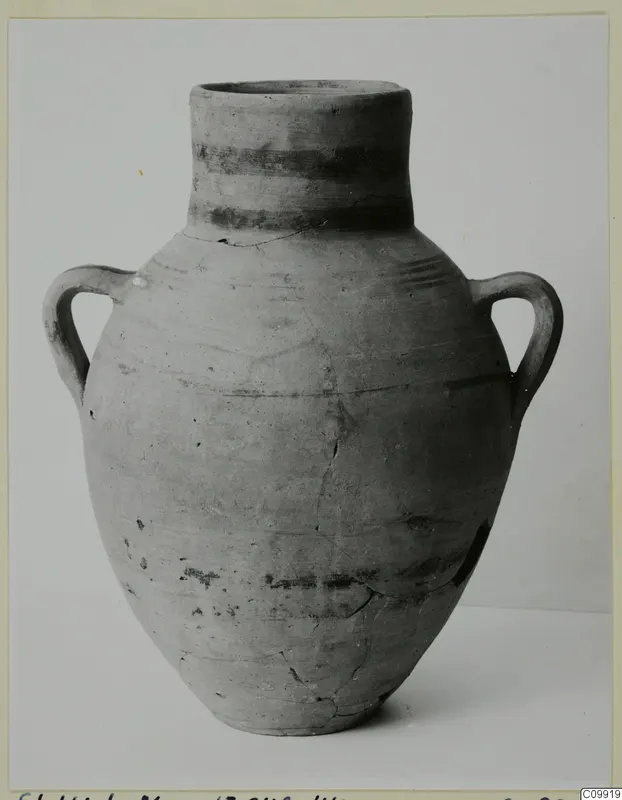 Two-handled pottery jar with dark painted bands on the neck and body