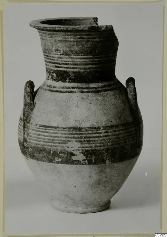 Two-handled painted pottery vessel with horizontal bands, rim broken on one side