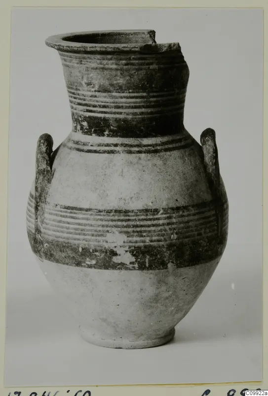 Amphoriskos, a pottery vessel with two handles, a broken rim and horizontal dark bands