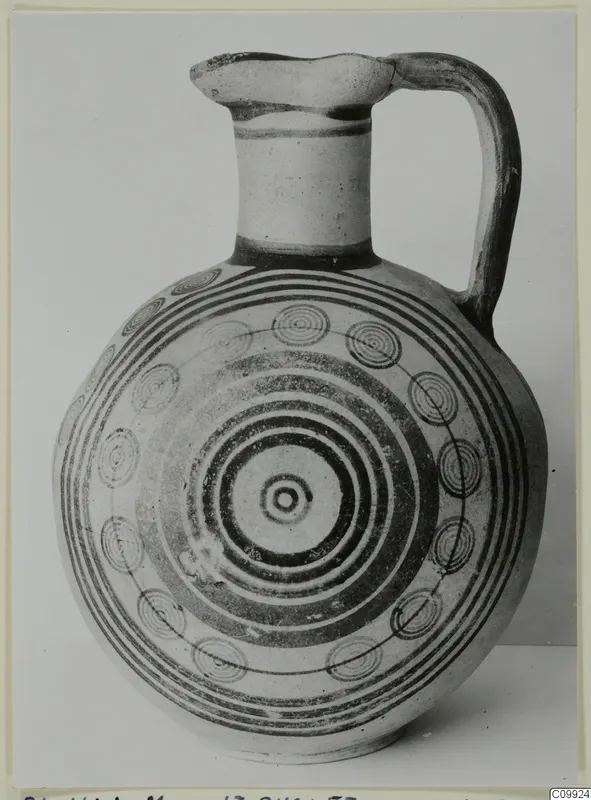 Jug with a round body painted with concentric circles and spirals, from the Pottery Bichrome IV group