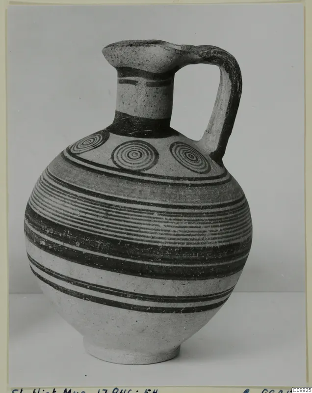 Bichrome IV jug with a single loop handle, horizontal dark bands and concentric circles on the shoulder