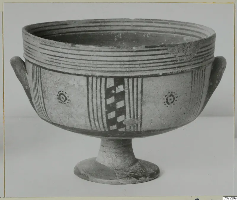 Footed bowl with two side handles, painted with stripes, a checkerboard panel and dotted ring motifs