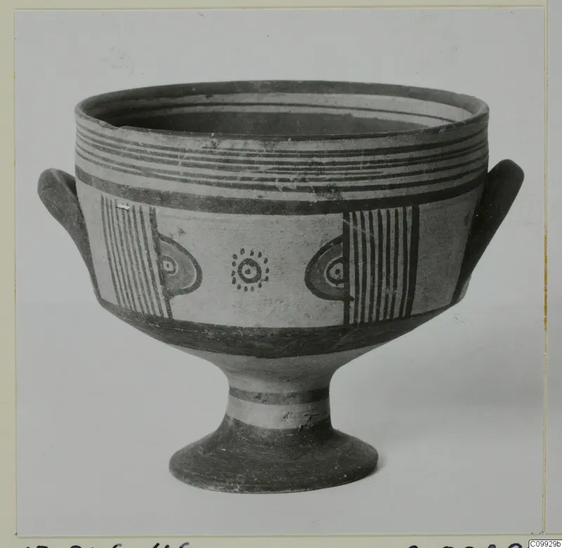 Footed bowl with two small handles and painted bands, with stripe and eye-like motifs on the body.