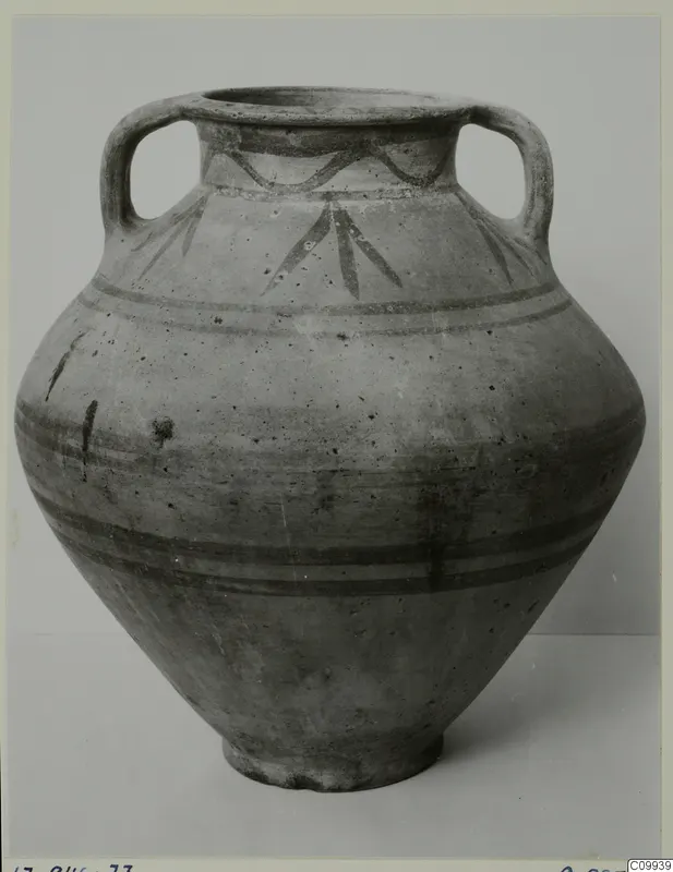 White Painted V amphora: a large two-handled jar with dark painted bands and leaf-like strokes on the shoulder