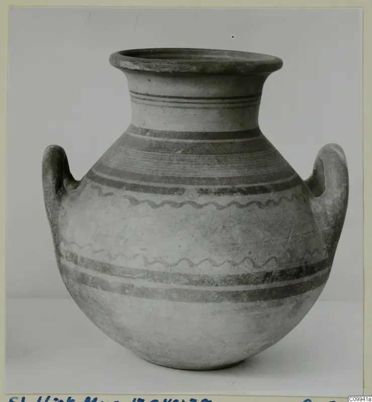 Pottery Bichrome V jar with two handles, banded and wavy painted decoration on a light ground.