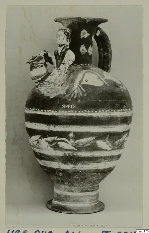 Cypro-Hell.I pottery vessel with a modelled standing figure on the shoulder and painted fish bands