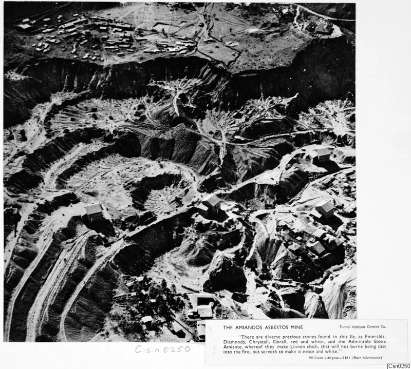 Aerial view of the Amiandos asbestos mine, with terraced open-cast workings, haul roads and buildings