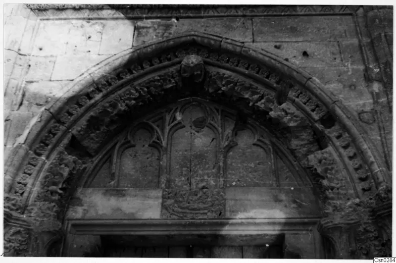 Carved stone doorway with a pointed arch and leaf ornament on the arch edges, Nicosia