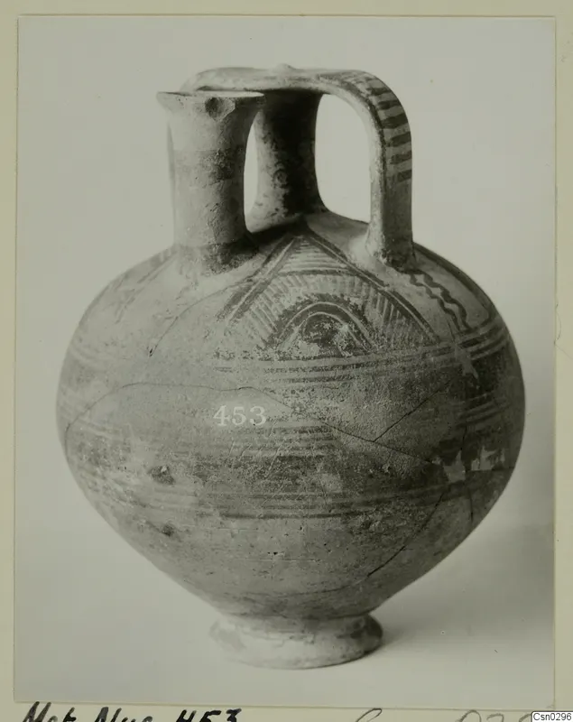 White Painted I jug with a spout, strap handle and ring base, decorated with painted bands and arched motifs