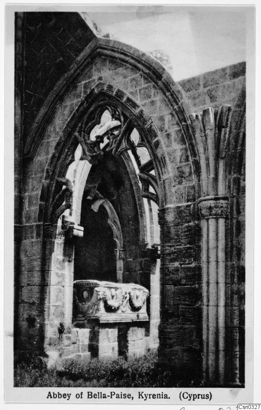 Abbey of Bella-Paise, Kyrenia: pointed arch with carved tracery and a carved stone chest in a ruined building