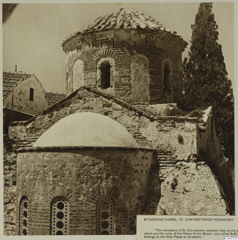 Byzantine chapel at St. Chrysostomos Monastery, with a tiled domed roof and a domed stone apse beside a tall cypress tree.