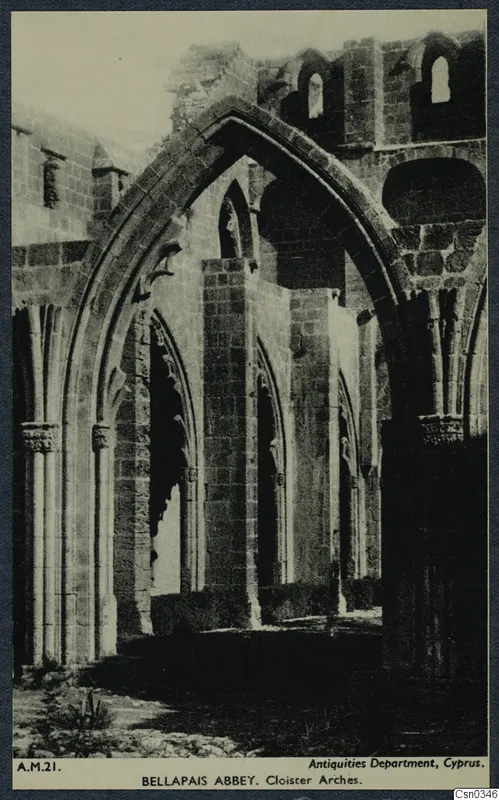 Pointed arches and stone piers of the cloister at Bellapais Abbey, seen as ruins