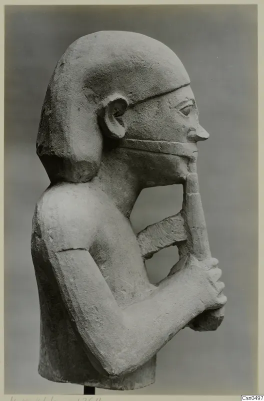 Limestone Cypro-Egyptian bust in profile, facing right, with both hands holding a long strip against its chin