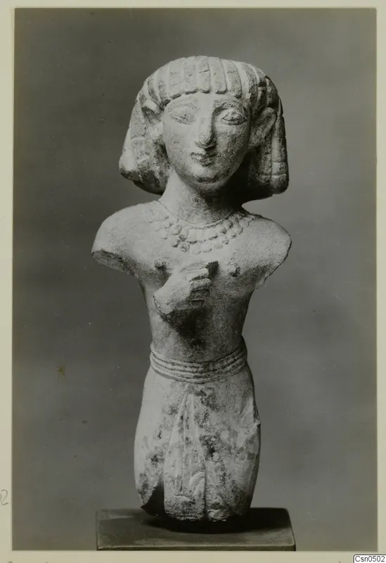 Limestone Cypro-Egyptian figure, head and upper body, rising from a square base