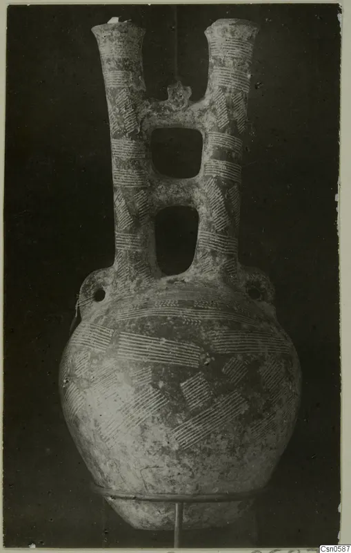 Double-spouted pottery vessel with bands and hatched patterns painted in pale line, a find from Cyprus, Cyprus Museum.