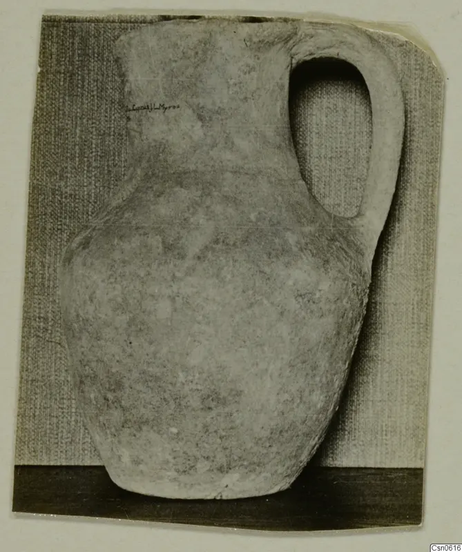Pale pottery jug with a single loop handle and pear-shaped body, from Cyprus