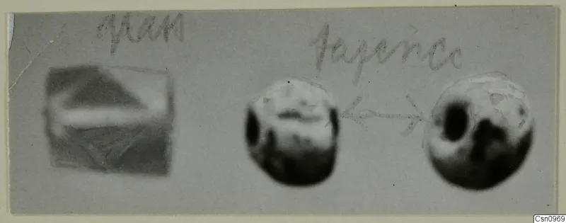 Grey card with blurred photographs of a rectangular object and two round objects, joined by a drawn arrow, with handwritten labels.