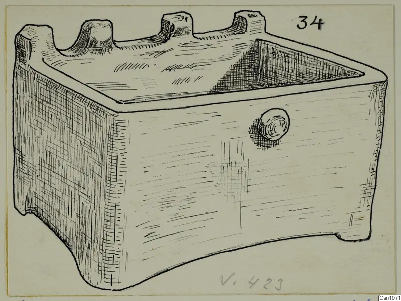Ink drawing of a rectangular terracotta object with raised projections along its open top and a round knob on its front
