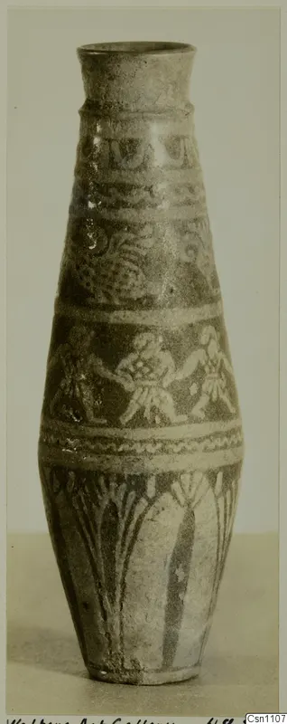 Faience pot from the Walters Art Gallery, with bands of figures and vertical motifs on its body