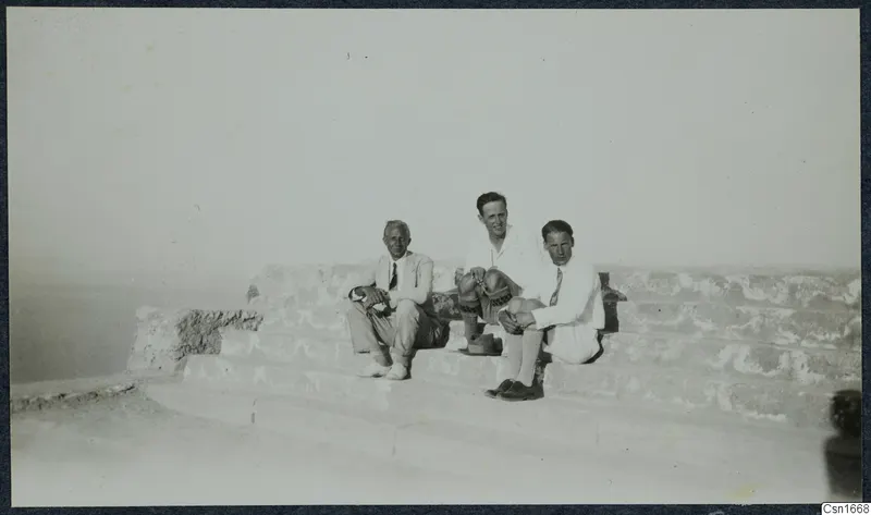John Lindros, Einar Gjerstad and Alfred Westholm sitting on stone steps at Vouni Palace