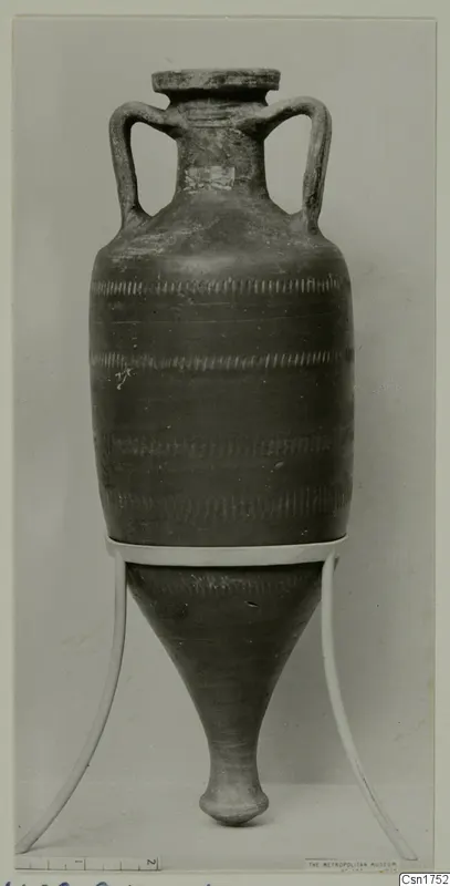 Two-handled jar with a tapering pointed base and bands of notched decoration, shown on a white stand