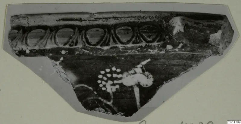 Cypro-Hell. II sherd with a looped band along its upper edge and a branching motif below
