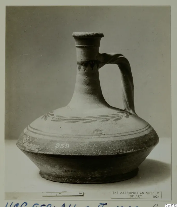 Cypro-Hell. II pottery jug with a single handle and a painted leaf band around the shoulder