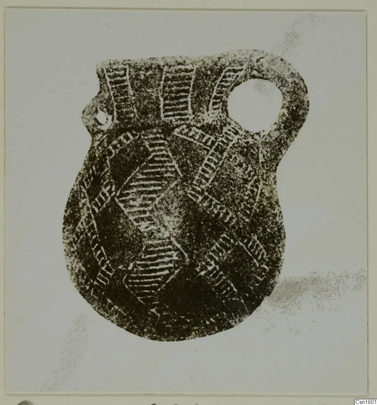 Red Polished III jug with a large loop handle and hatched incised decoration