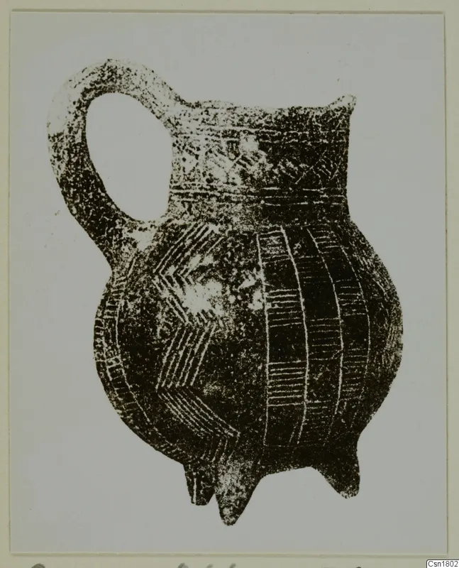 Red Polished III jug from Cesiz with a loop handle and incised decoration