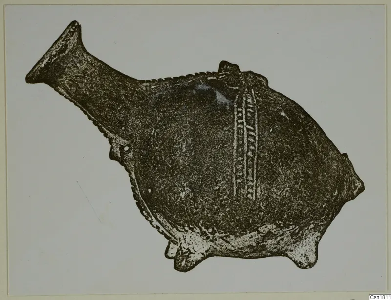 Red Polished III jug with a flaring spout and a vertical band of impressed decoration on its body
