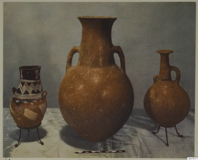 Three pottery vessels on wire stands with a scale bar in front, from Vounous, Red Polished I