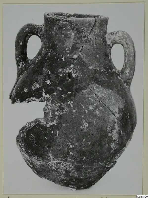 Red Polished I pottery vessel from Vounous, with two loop handles and a broken lower body