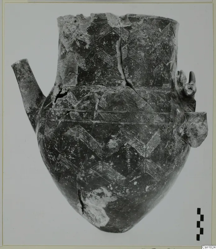 Pottery jar, Red Polished I, with incised chevron pattern and a side spout