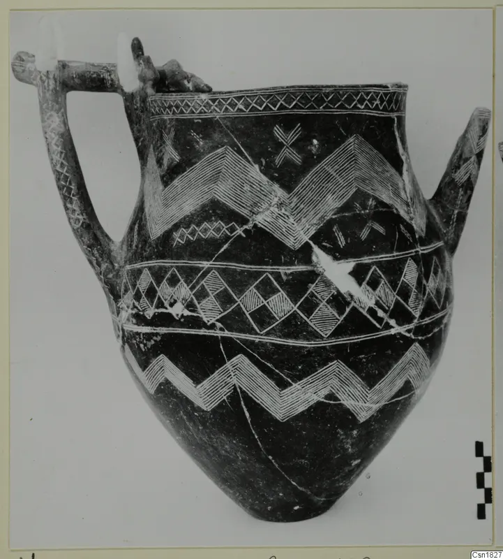 Dark polished vessel with white-painted zigzag and lattice bands, from Vounous
