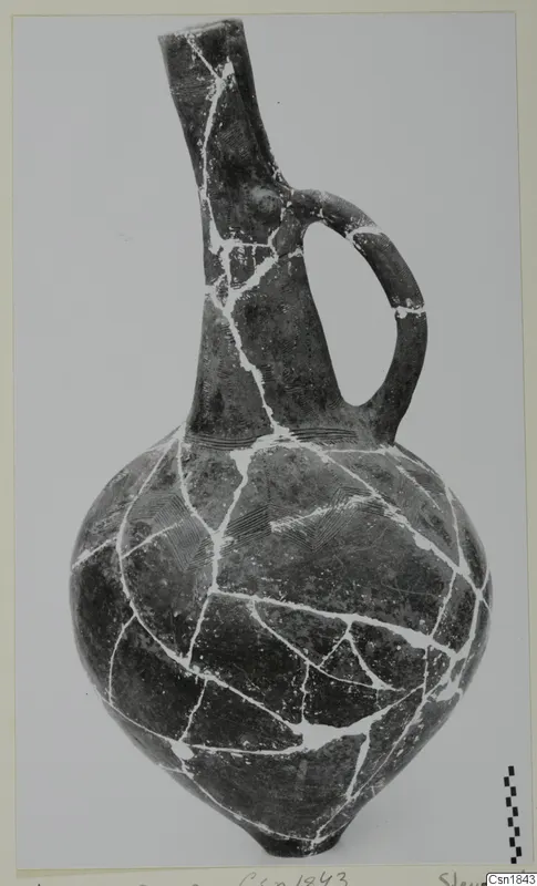 Red Polished I jug from Vounous with a single handle and incised patterns