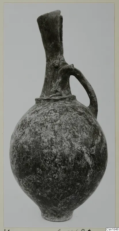 Red Polished I vessel from Vounous, with a single loop handle and a tall neck
