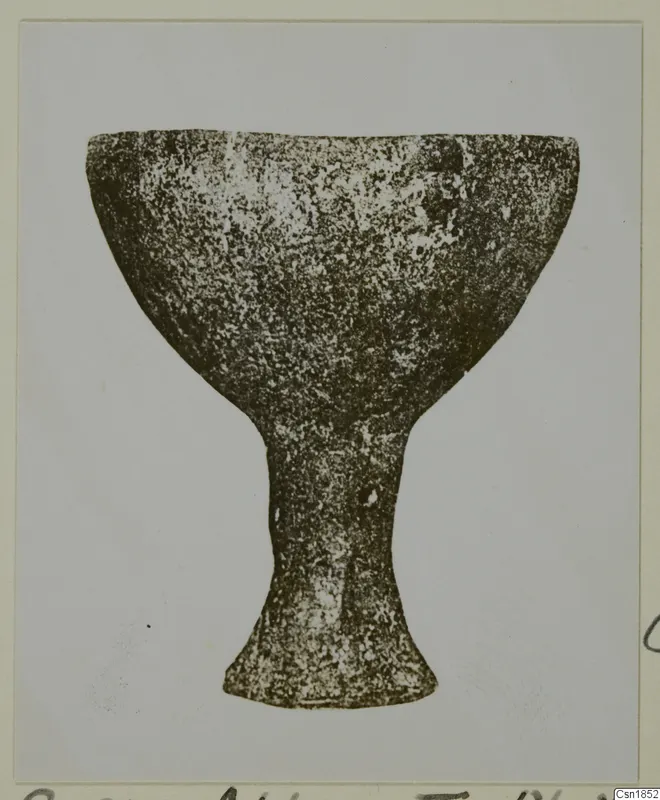 Red Polished I bowl, a footed bowl with a wide cup on a narrow stem, shown on a card mount.