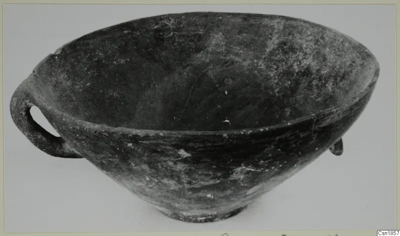 Red Polished I bowl from Vounous with a loop handle, seen from the side