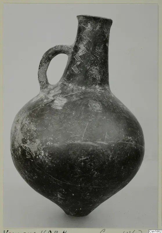 Pottery Red Polished I jug from Vounous with a loop handle and incised zigzag decoration on the neck