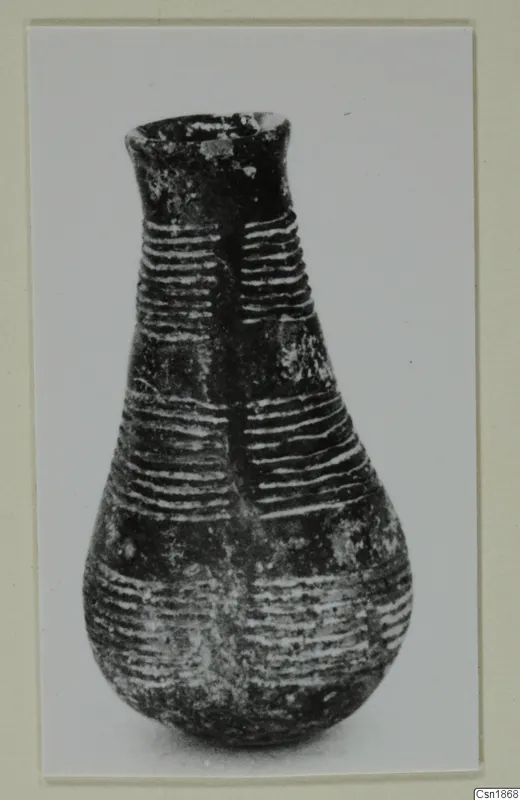 Pottery Red Polished I vessel from Vounous with a narrow neck and banded lines