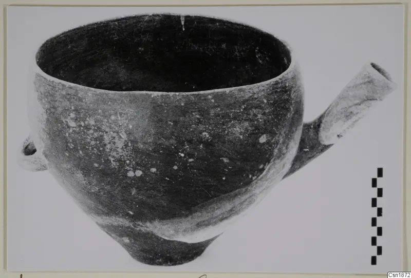 Pottery bowl, Red Polished I, with a tubular spout to the right and a small loop handle on the left