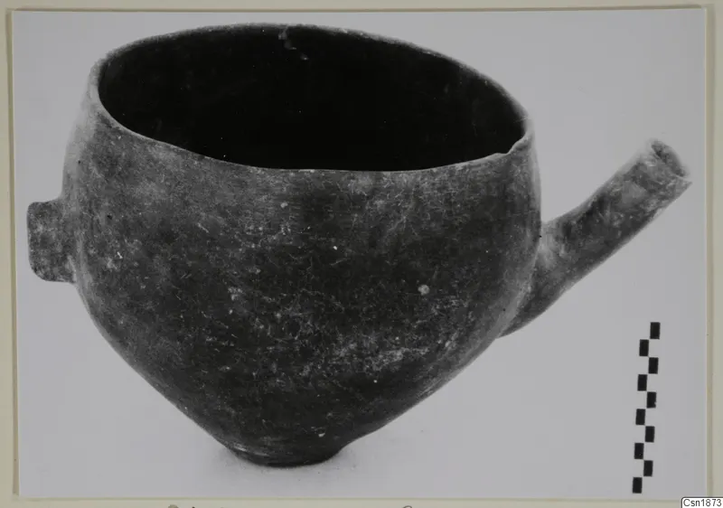 Red Polished I pottery vessel from Vounous with a tubular spout, shown with a scale bar