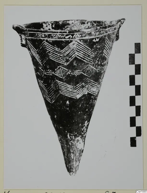 Conical pottery vessel with two small lugs and incised chevron bands, from Vounous