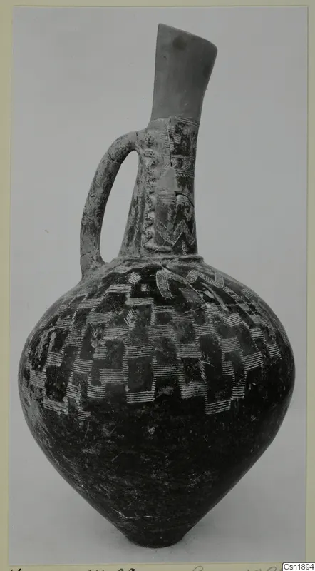 Pottery Red Polished I Stewart jug from Vounous: single-handled, with a flaring neck and white linear pattern on the body