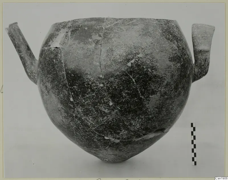 Pottery Red Polished I vessel with two tubular spouts, from Vounous