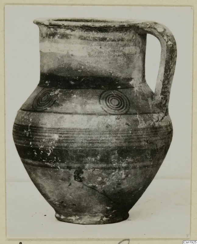 Jug with a loop handle, banded body and two concentric-circle motifs on the shoulder, from Idalion