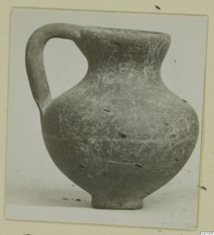 Pottery juglet with a strap handle, Bichrome-Red I_IV - IV_VII, photographed alone